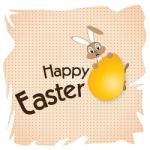 Easter Bunny With Big Gold Egg On A White Paper. Happy Easter Day Stock Photo