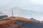 Electric Lines In Mountains Stock Photo