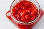 Pureed Tomatoes In A Glass Jar Stock Photo