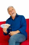 An Old Man Holding Money Stock Photo