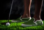 Man Putting Golf On Green Field Stock Photo