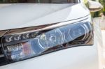 Closeup Headlights Of Modern White Car With Led Daylight Running Lights Stock Photo