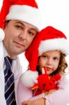 Family Wearing Christmas Hat Stock Photo