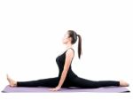 Portrait Of Asian Woman Wearing Black Body Suit Sitting In Yoga Meditation Position Isolated White Background Stock Photo