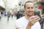 Man In Street With Cell Phone Stock Photo