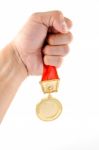 Hold Golden Medal Stock Photo