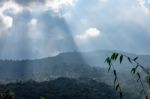 The Beauty Of The Sky When Light Hits The Clouds And Mountain Stock Photo