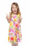 Excited Young Girl Showing Double Thumbs Up Stock Photo