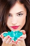 Pretty Woman With Blue Rocks Stock Photo