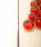 Fresh Cherry Tomatoes On A Cluster Stock Photo