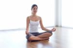 Beautiful Young Woman Doing Yoga Exercises At Home Stock Photo