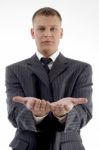 Businessman Showing Begging Gesture Stock Photo