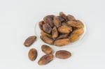 Dried Dates In The Dish On White Background Stock Photo