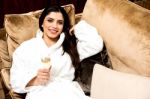 Relaxed Pretty Woman Enjoying Champagne Stock Photo