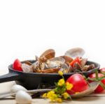 Fresh Clams On An Iron Skillet Stock Photo