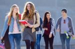 A Group Of Students Having Fun After School Stock Photo