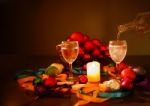 Two Glasses Of Champagne With A Christmas Decor In The Background Stock Photo