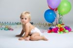 Baby Girl Celebrating Her First Bithday With Gourmet Cake And Ba Stock Photo