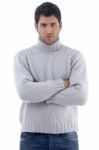 Young Man With Crossed Arms Stock Photo