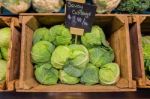 Fresh Cabbage Vegetable In Wooden Box Stall In Greengrocery With Price Chalkboard Label Stock Photo