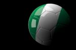 Nigeria Soccer Ball On Dark Background Stock Photo