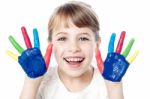 Smiling Girl With Painted Hands Stock Photo