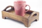 Pink Mug On Wooden Tray Isolated On White Background Stock Photo