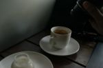 Coffee On Table Wood And The Man Using Camera Stock Photo