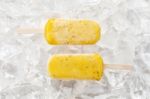 Passion Fruit  Popsicle Yummy Fresh Summer Fruit Sweet Dessert Wood Teak White Stock Photo