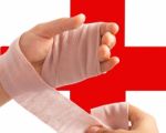 Wrapping Bandage Around Hand Stock Photo