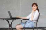 Portrait Of Thai Adult Businesswoman Beautiful Girl Using Computer Notebook Stock Photo