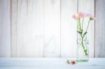 Home Interior Decor,bouquet Of Pink Flowers In A Vase On White Wood Table  Background Stock Photo