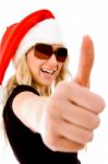 Christmas Female Showing Thumb Up Stock Photo