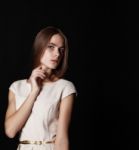 Young Beautiful Girl In A Bright Dress Stock Photo