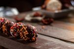 Chocolate Ball On A Wooden Stock Photo