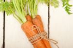 Baby Carrots Bunch Tied With Rope Stock Photo