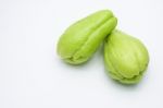 Sliced Fresh Chayote And Half Isolated On White Background Stock Photo