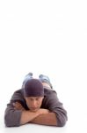 Young Man Lying On Floor Stock Photo