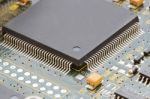 Close Up Of Electronic Circuit Board With Processor Stock Photo