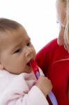 Mother Holding Her Baby Stock Photo