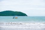 Sand Beach With Blue Ocean Stock Photo