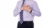 Corporate Man Suffering With Heart Attack Stock Photo