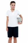 Young Girl Holding A Rugby Ball Stock Photo