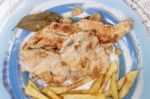 Turkey Steak With French Fries Stock Photo