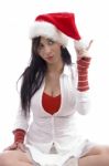 Young Female Holding Christmas Hat Stock Photo