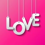 Love Word By White Paper Stock Photo