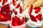 Delicious Vanilla Cupcake With Strawberry Frosting And Fresh Str Stock Photo