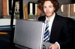 Smart Confident Young Businessman With Suitcase Stock Photo