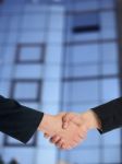 Businesspeople handshaking Stock Photo