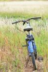 Bicycle In Tropical Field Stock Photo